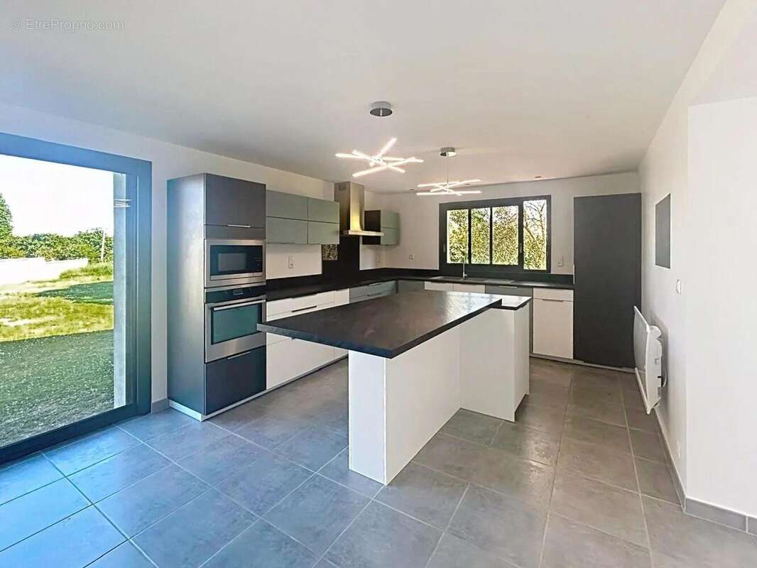 Photo 4 - Maison à LAUNAC