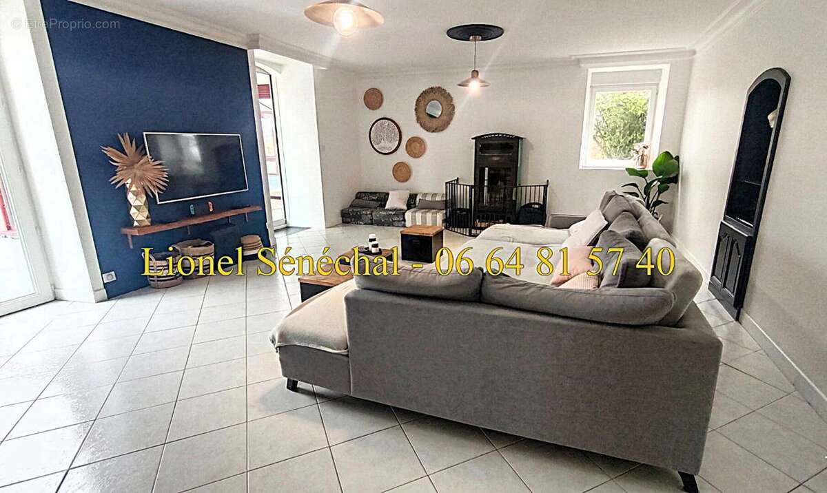 Maison à SAVIGNE-L'EVEQUE