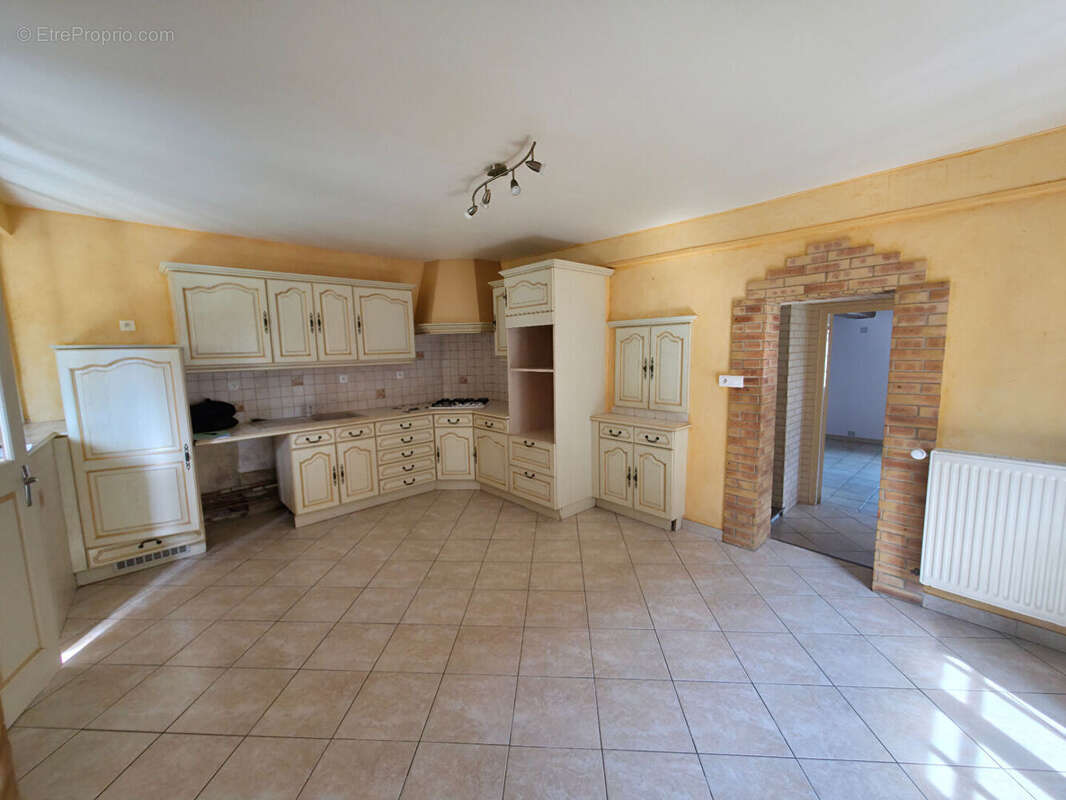 Maison de Bourg - photo 2
