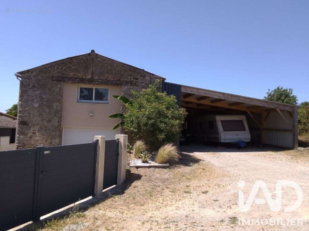 Photo 2 - Maison à SAINT-ETIENNE-DU-BOIS