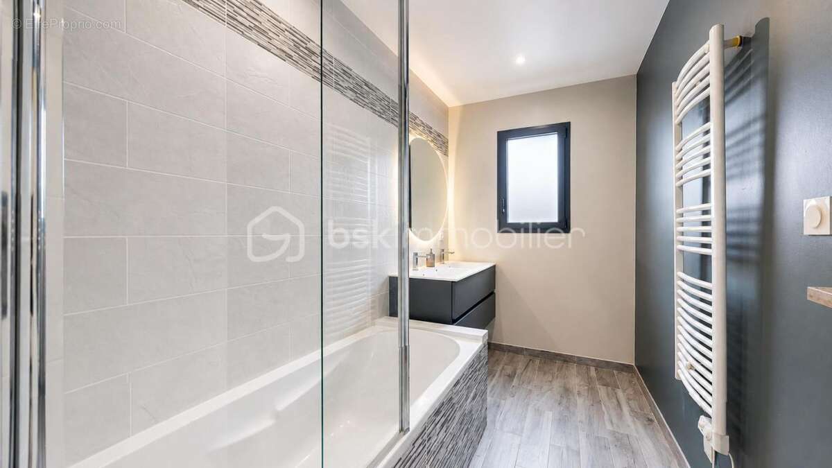 Maison contemporaine de plain-pied – 128 m² – 4 chambres – Double garage - photo 8