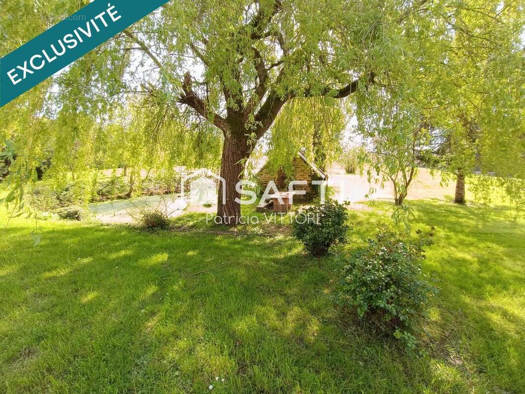 Photo 4 - Maison à LE BOURGNEUF-LA-FORET