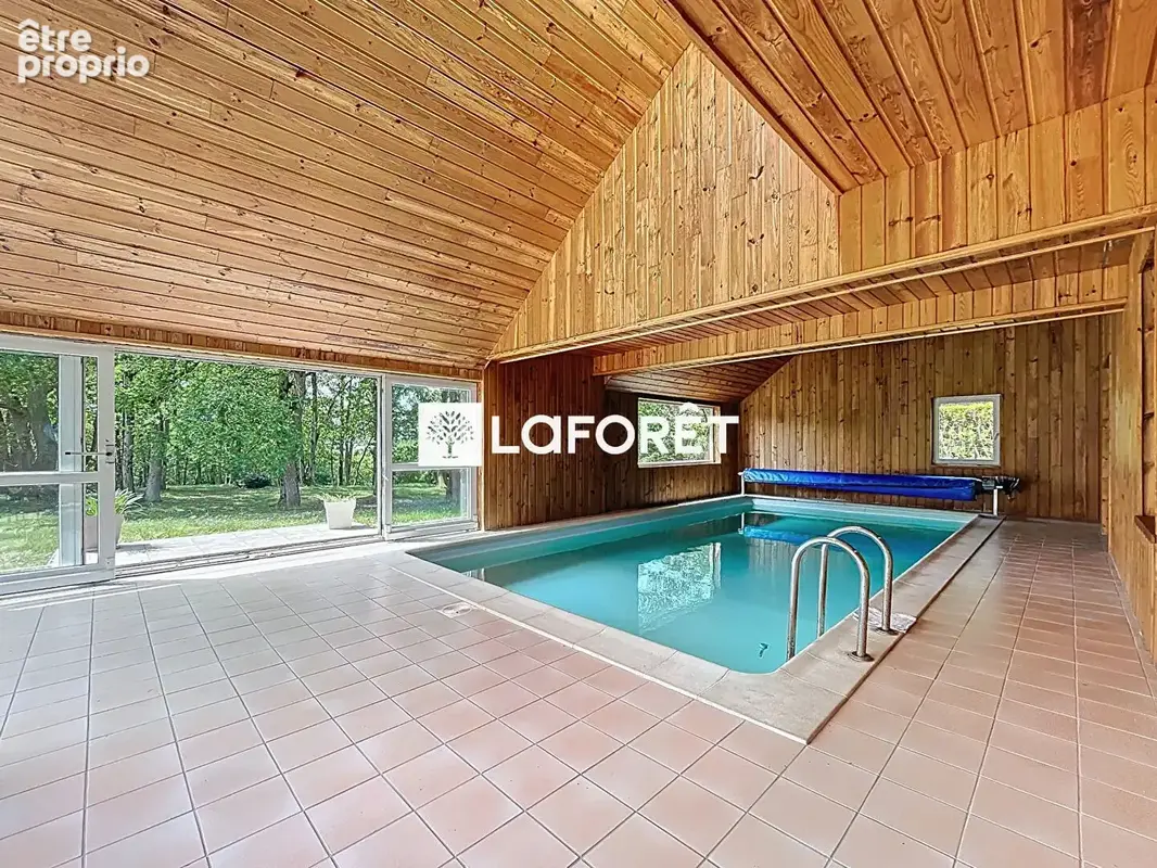 Maison familiale située dans un cadre verdoyant avec grand terrain - photo 13