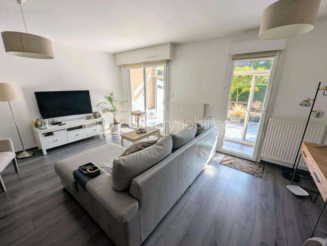 Appartement en RDC avec un grand balcon / extérieur et garage situé à FOUGERES 35300 - photo 2