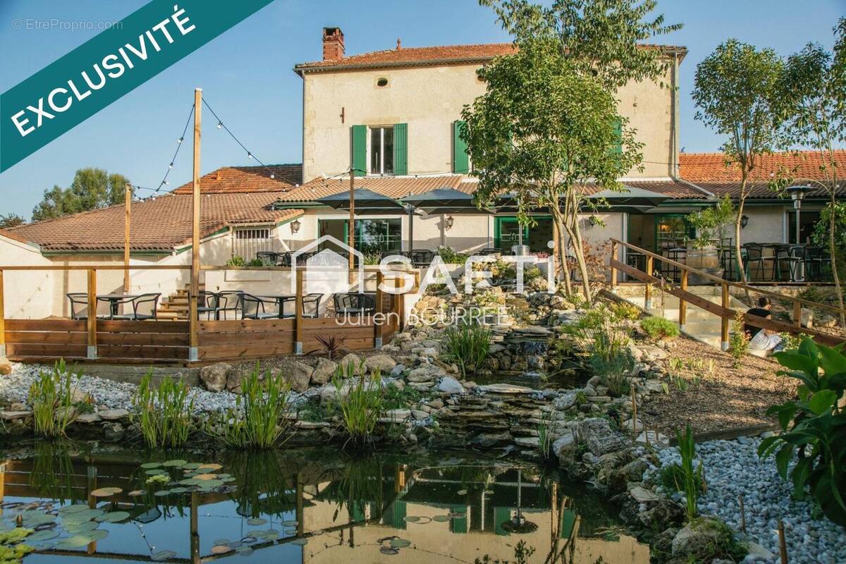 Photo 1 - Commerce à LANGON