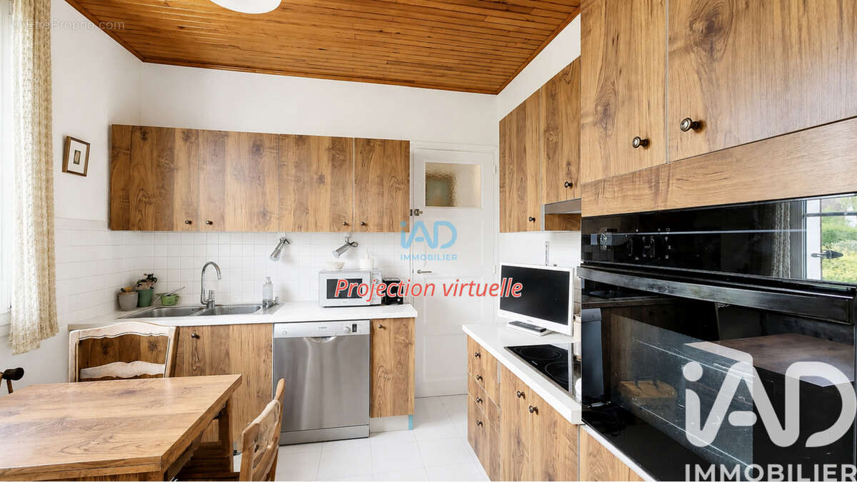 Photo 2 - Maison à SAINT-ETIENNE-DU-ROUVRAY