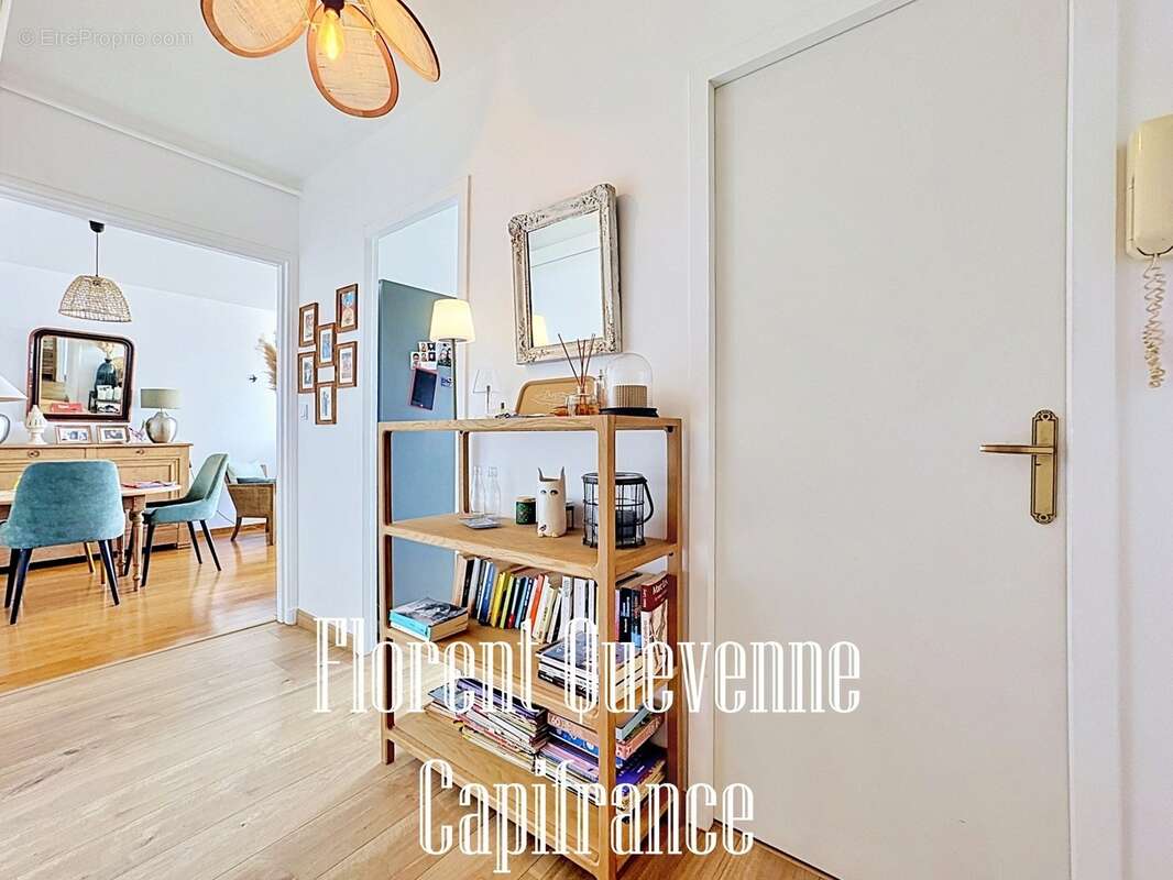 Appartement 2 pièces rénové avec balcon, parking et cave - photo 7