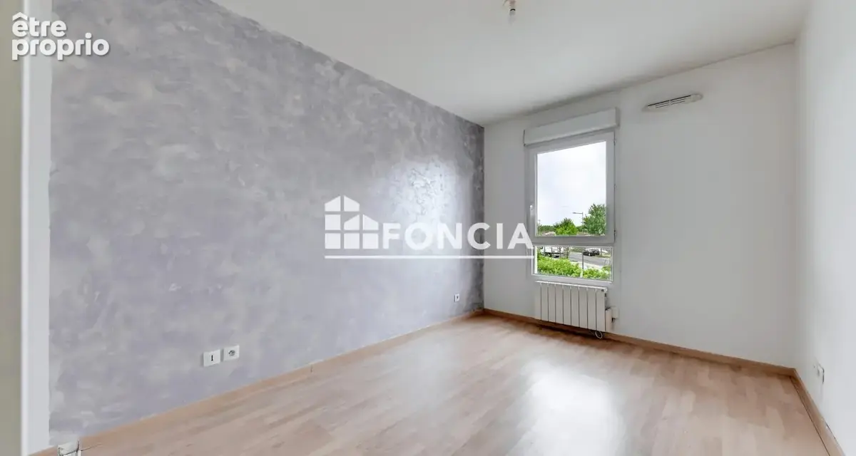 VAULX-EN-VELIN – T3 de 64 m² avec balcon et garage en résidence sécurisée de 2010 - photo 4