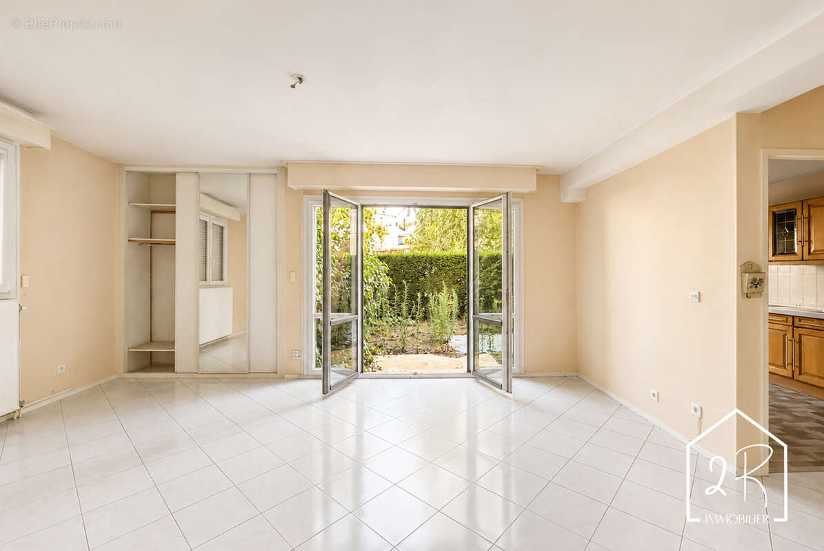Appartement 2 pièces de 64,15 m2 - Jardin privatif - photo 2