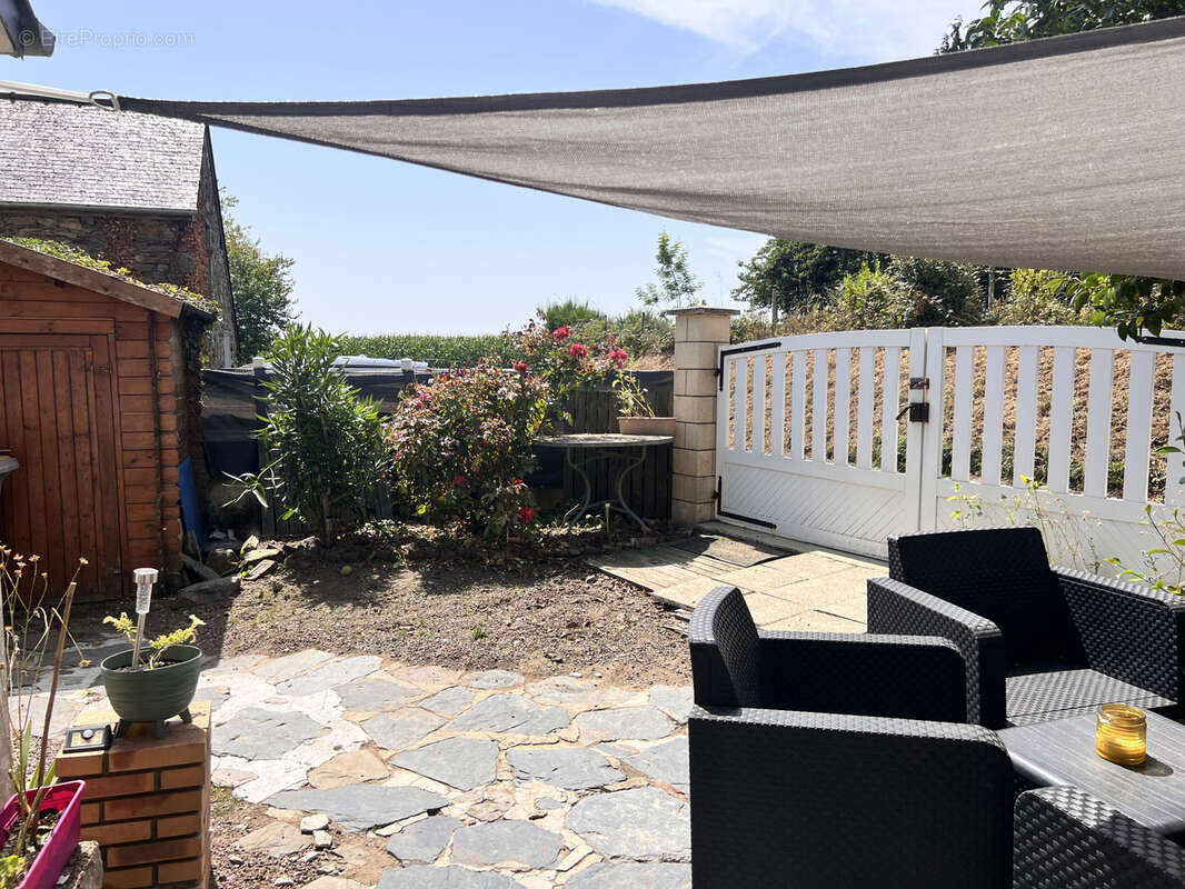 Maison à HENANBIHEN