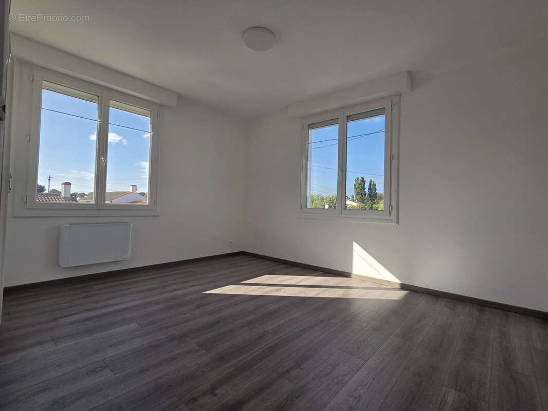 Ensemble immobilier d'habitations et de commerces - photo 5