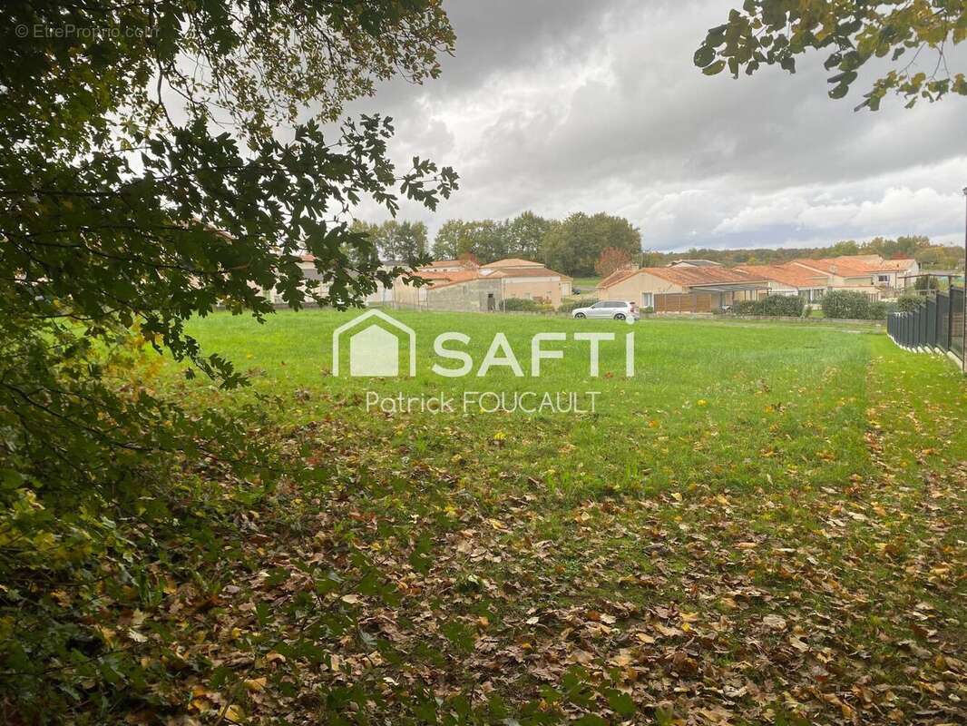 Photo 2 - Terrain à LHOMMAIZE