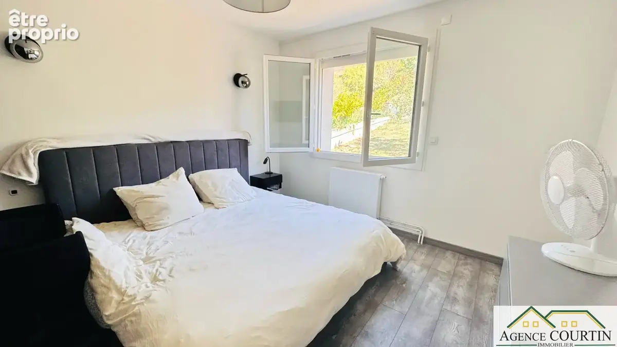 Maison familiale avec 4 chambres, terrain clos et vue dégagée à Lons-le-Saunier - photo 11
