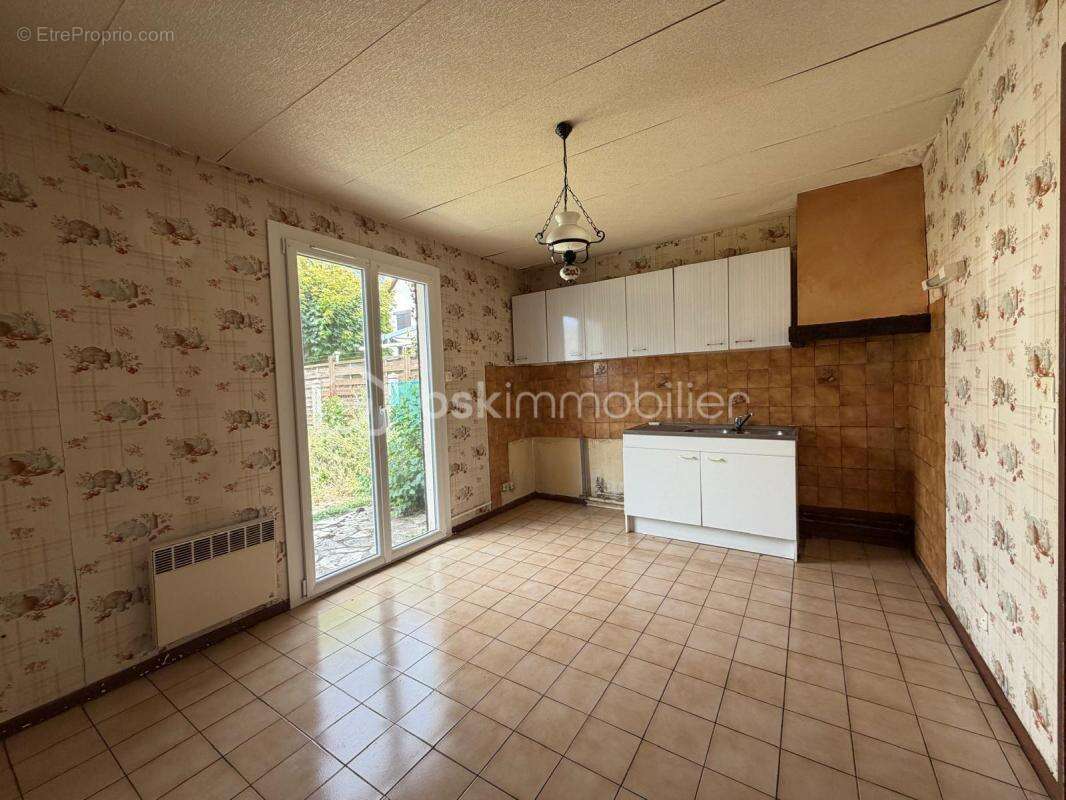 Maison familiale avec 3 chambres et sous-sol complet - photo 4