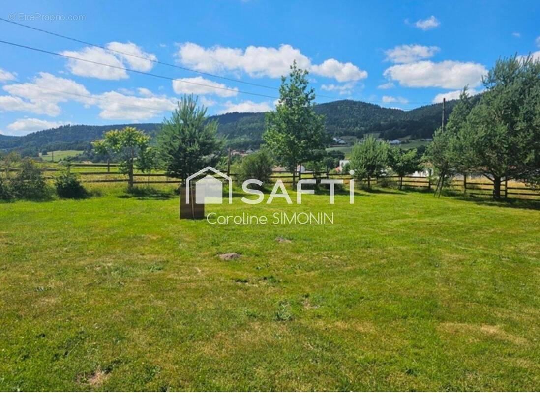 Photo 1 - Terrain à LE SYNDICAT