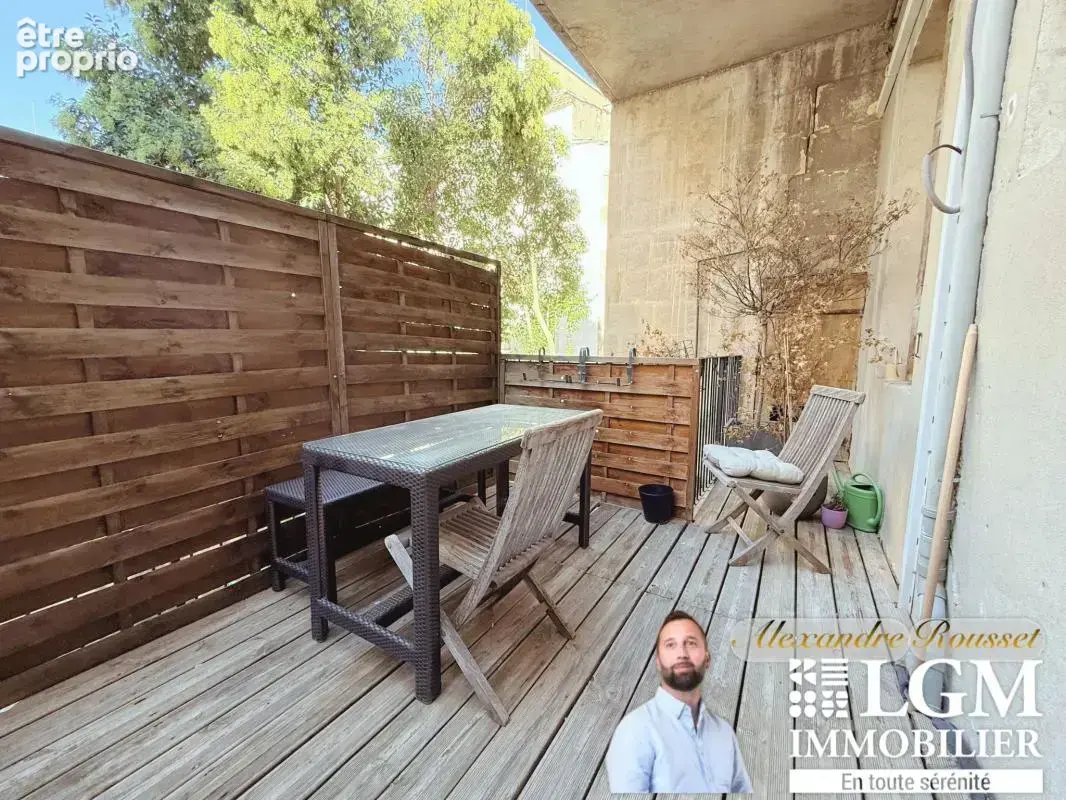  Appartement de caractère de 115 m² avec terrasse – Au cœur du centre historique de Nîmes - photo 17