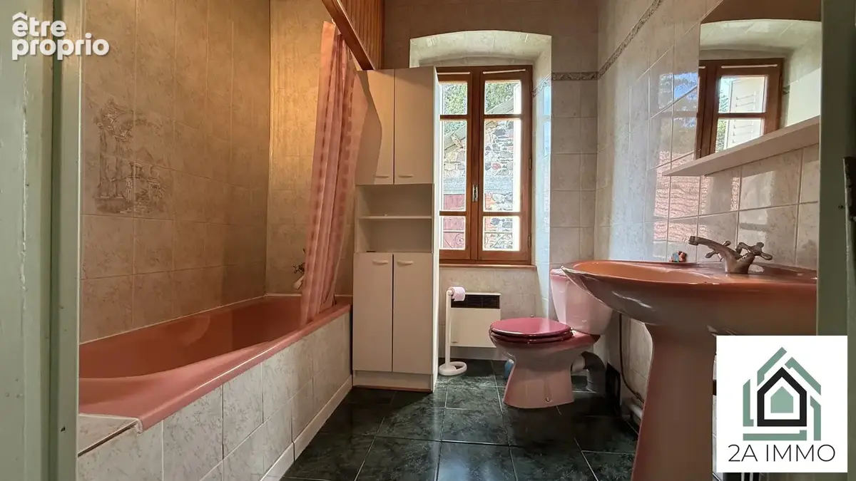 Maison 6 pièces 156 m² à vendre à Saint-Ours (63230) - photo 8