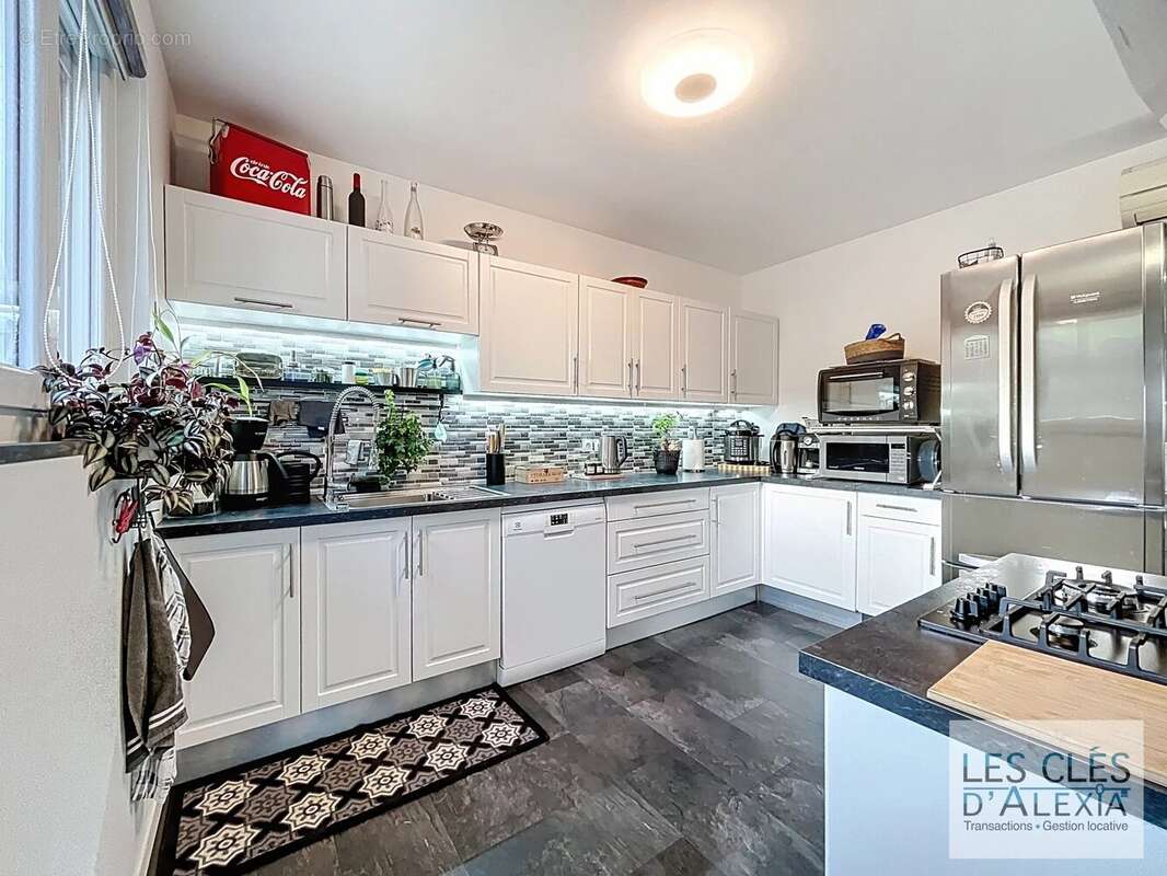 Maison à PONT-EVEQUE