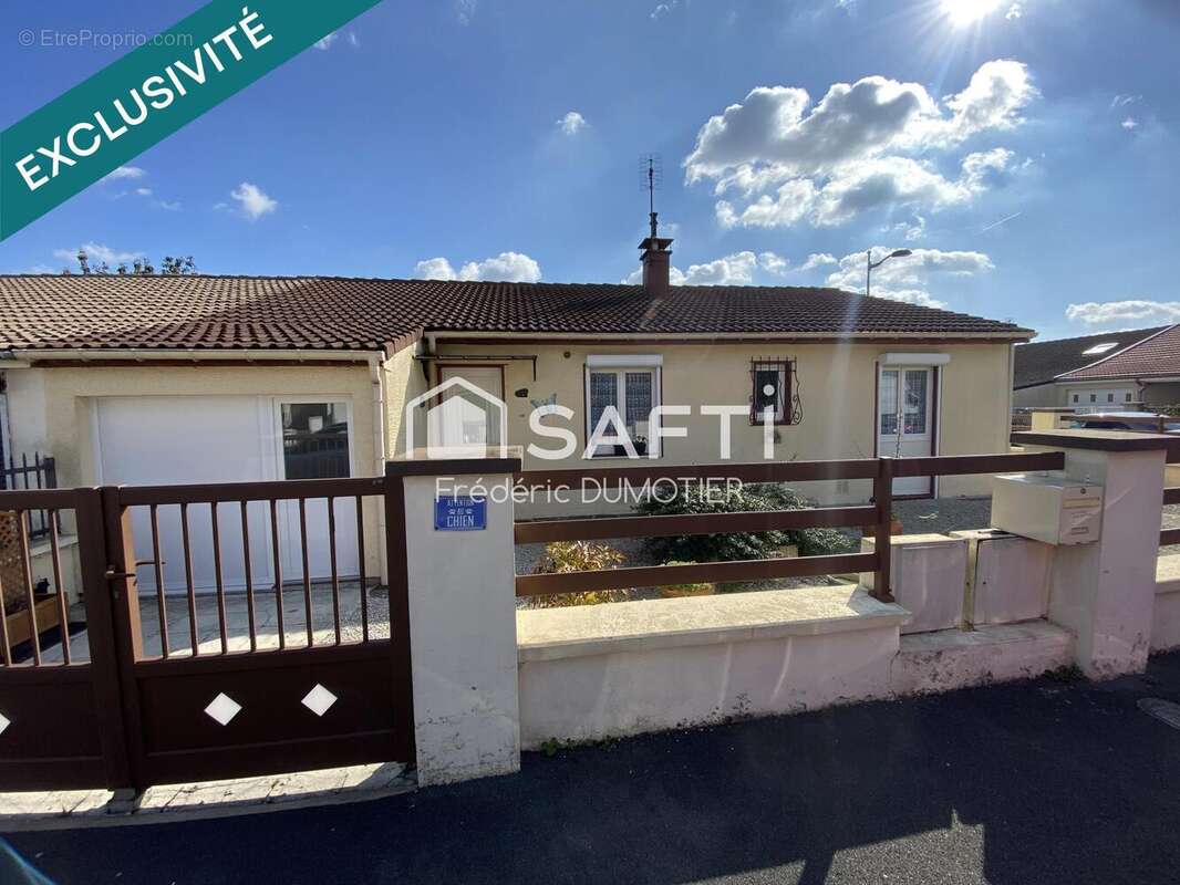 Photo 2 - Maison à SAINT-QUENTIN