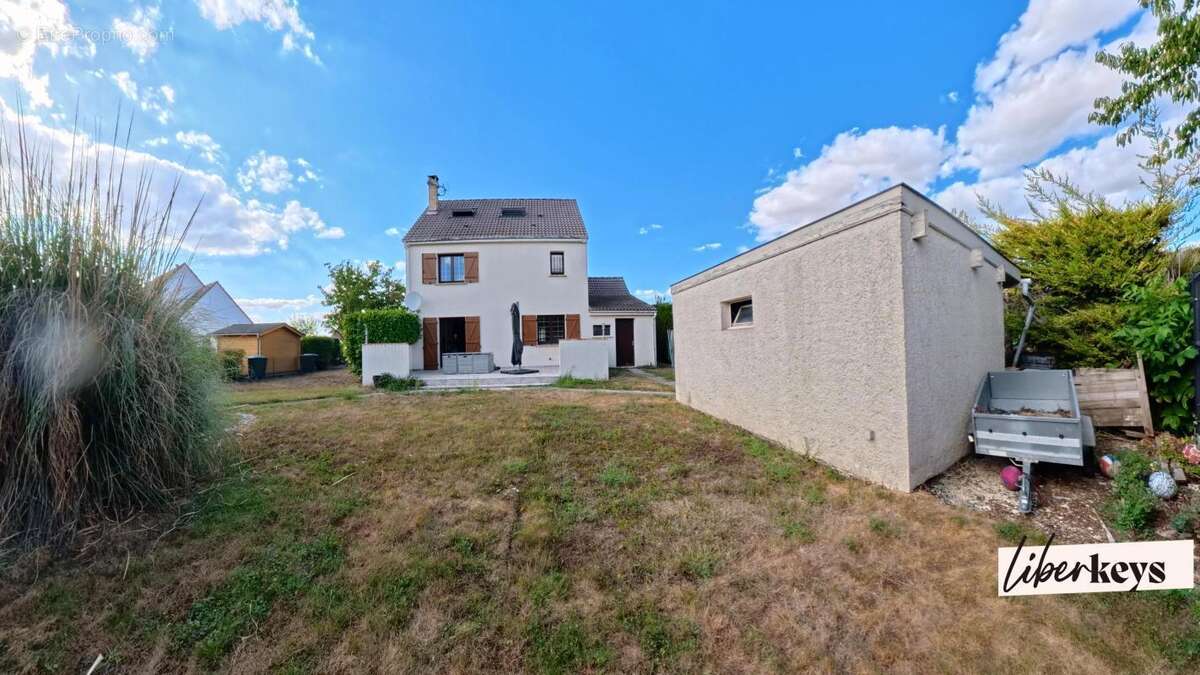 Pavillon avec garage - photo 2