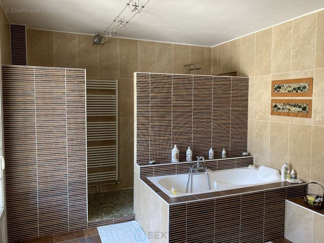 Villa située dans un secteur verdoyant très recherché - photo 11
