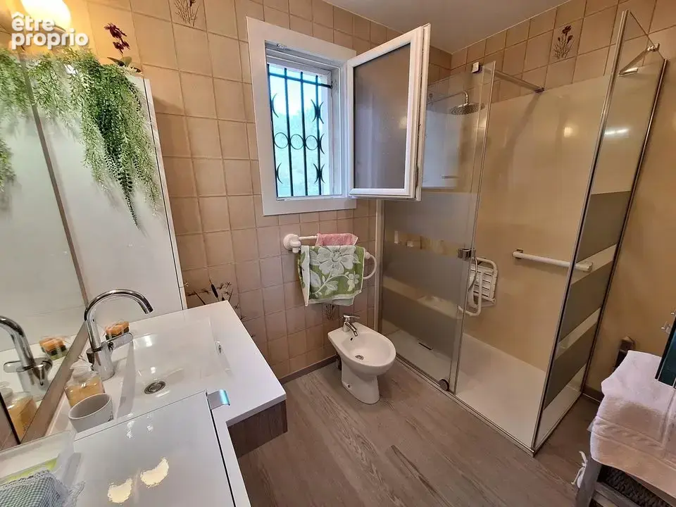 Maison 5 pièces 115 m² à vendre à Chateauneuf-Sur-Isere (26300) - photo 4