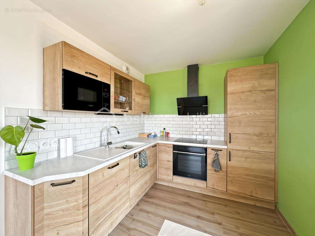 Appartement 3 chambres avec balcon et 3 places de parking - photo 4