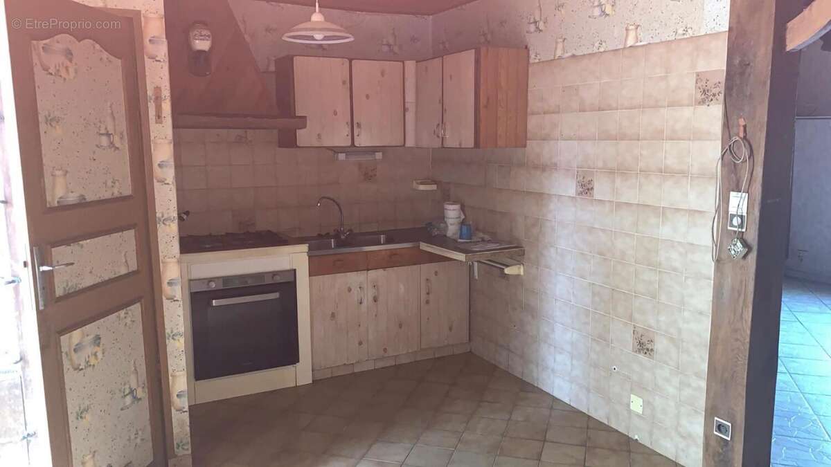 Photo 2 - Maison à COMMENTRY