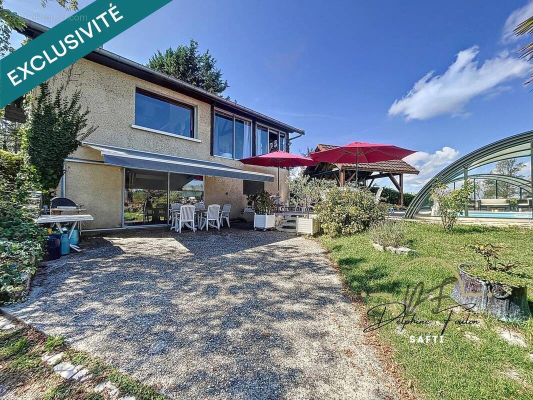 Photo 1 - Maison à VEYRINS-THUELLIN
