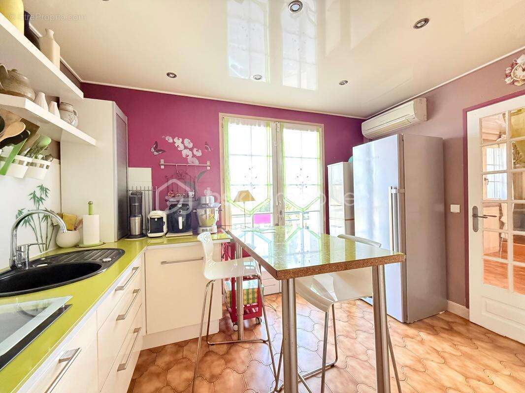 Maison spacieuse avec terrasse et jardin dans un cadre serein - photo 8