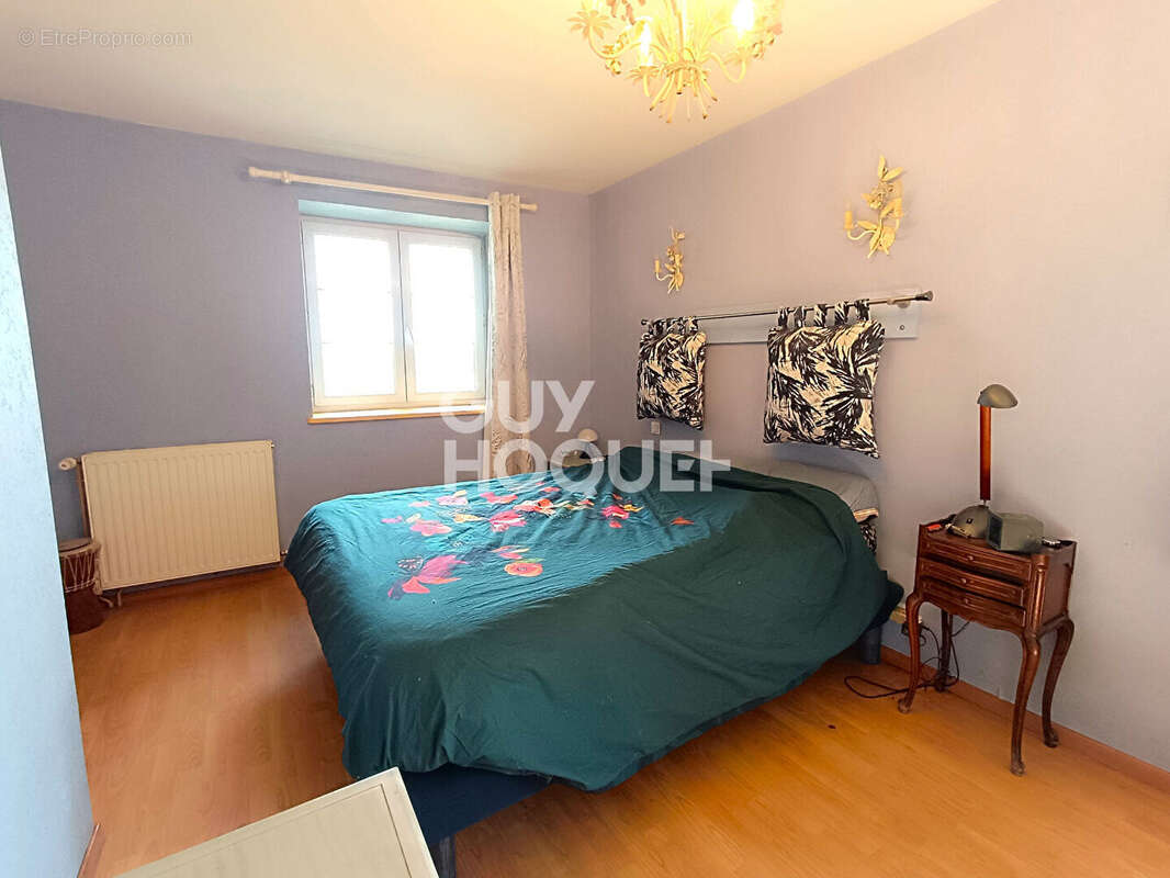 Maison à ESSERTINES-EN-DONZY