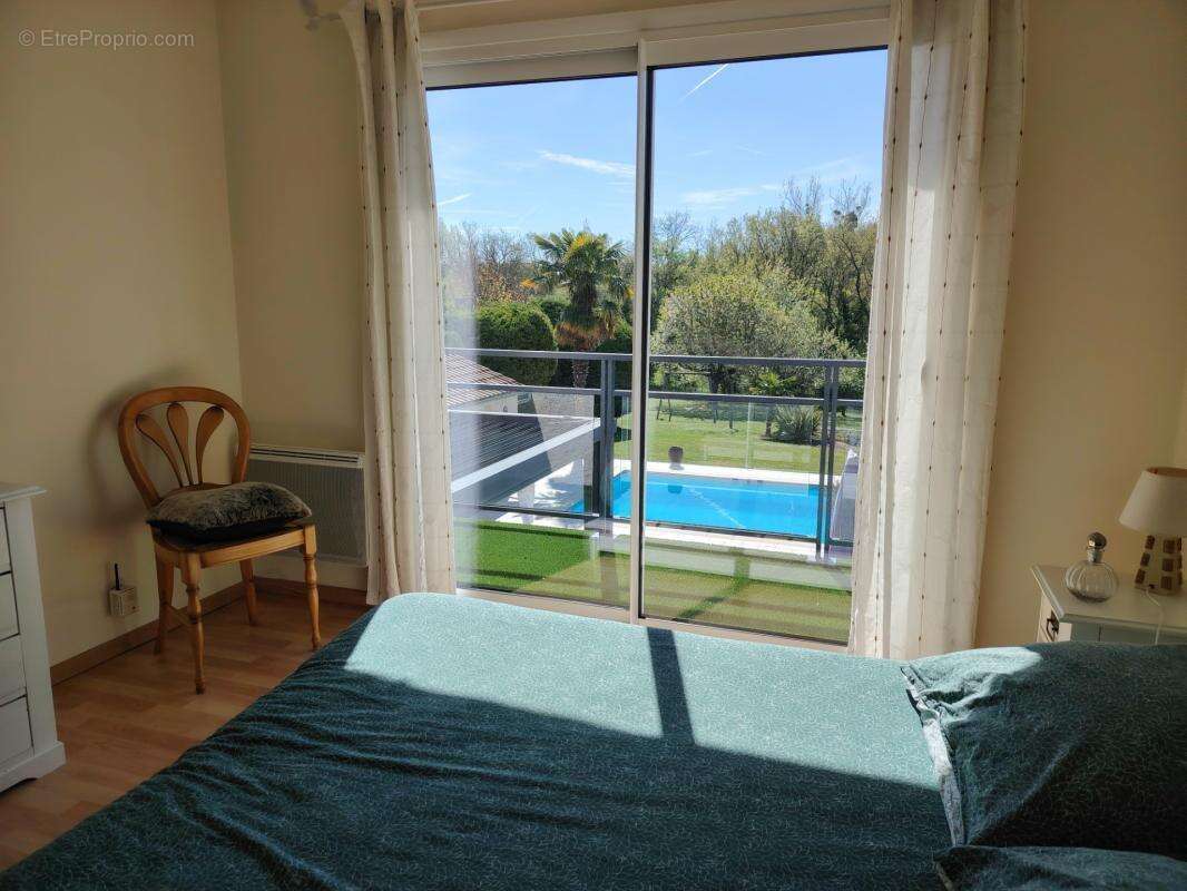 Belle Maison de 189 m² avec piscine dans environnement calme et verdoyant de Migné Auxances - photo 10