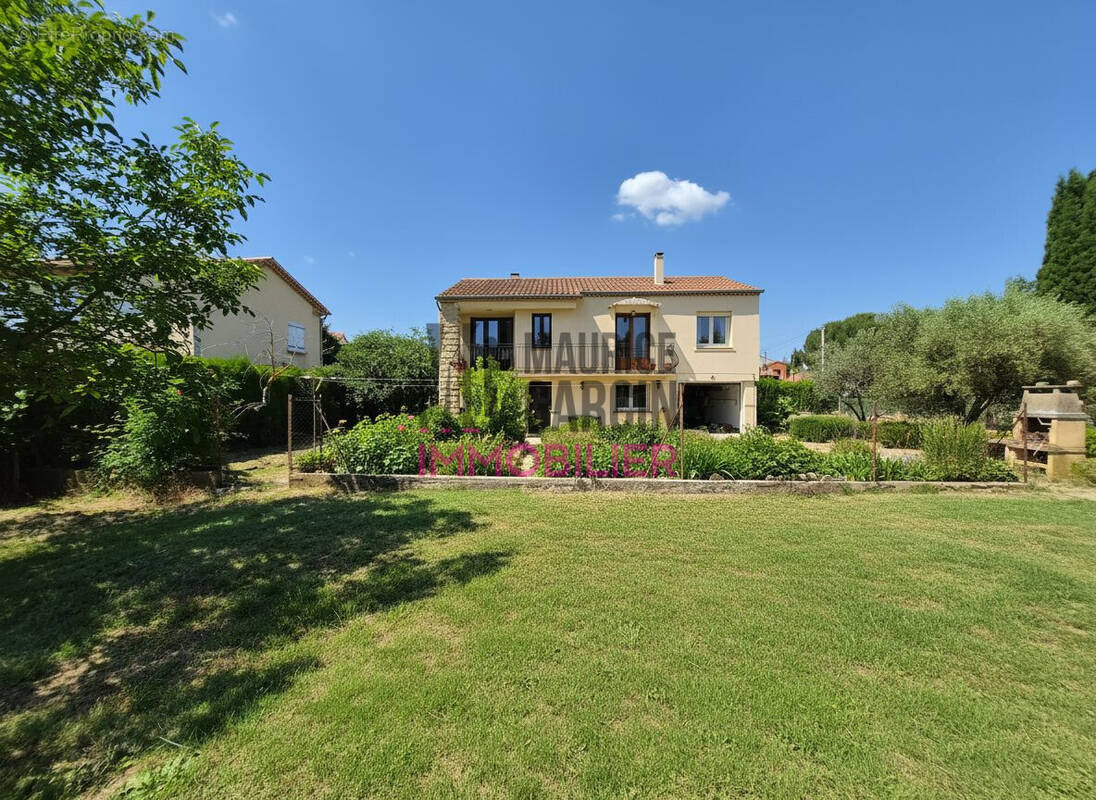 Maison à LAUDUN-L'ARDOISE