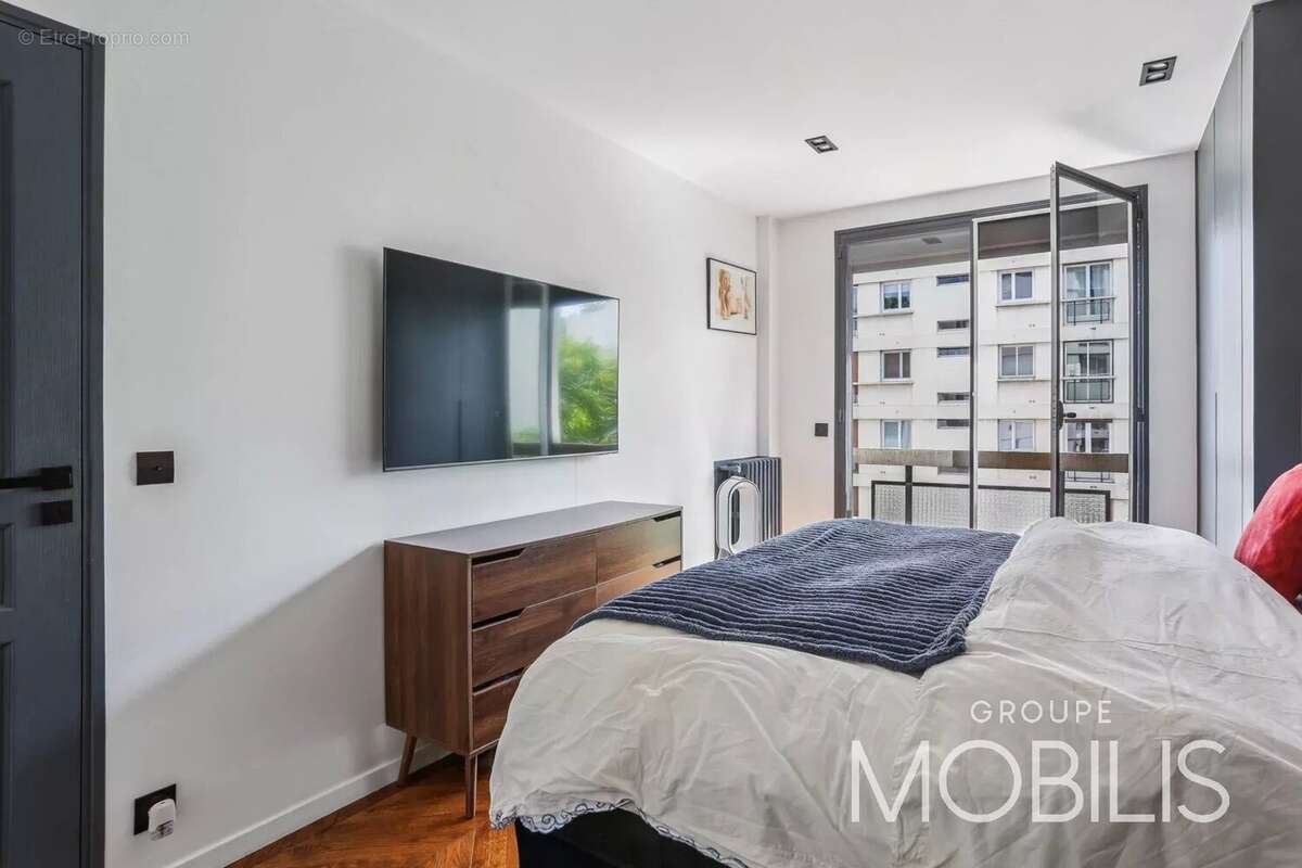 75016 - faisanderie/longchamp - appartement rénové de 60,84 m2 en étage élevé, avec balcon et vues dégagées - 1 chambre - traver - photo 2