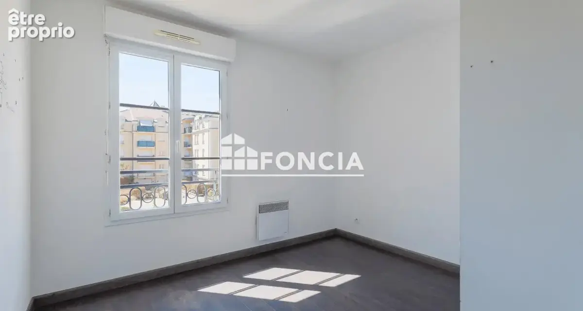 Appartement  3 pièces avec balcon, deux parkings et une cave - proche centre-ville - photo 6
