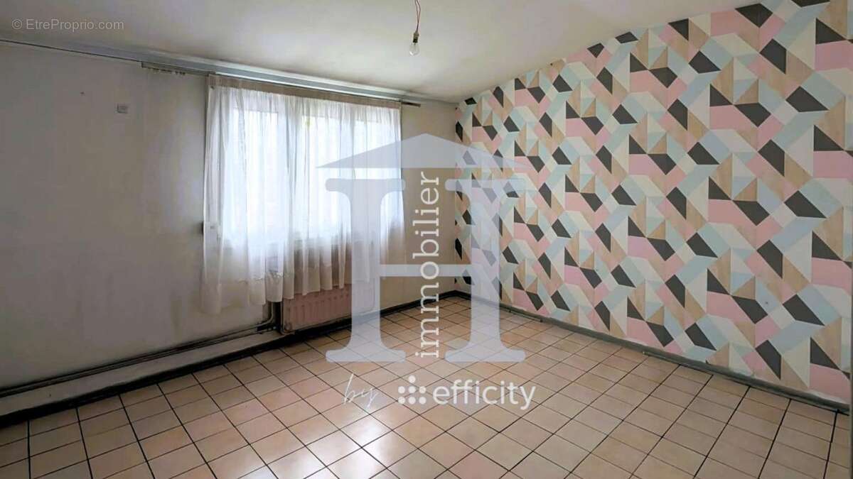 Maison à COURRIERES