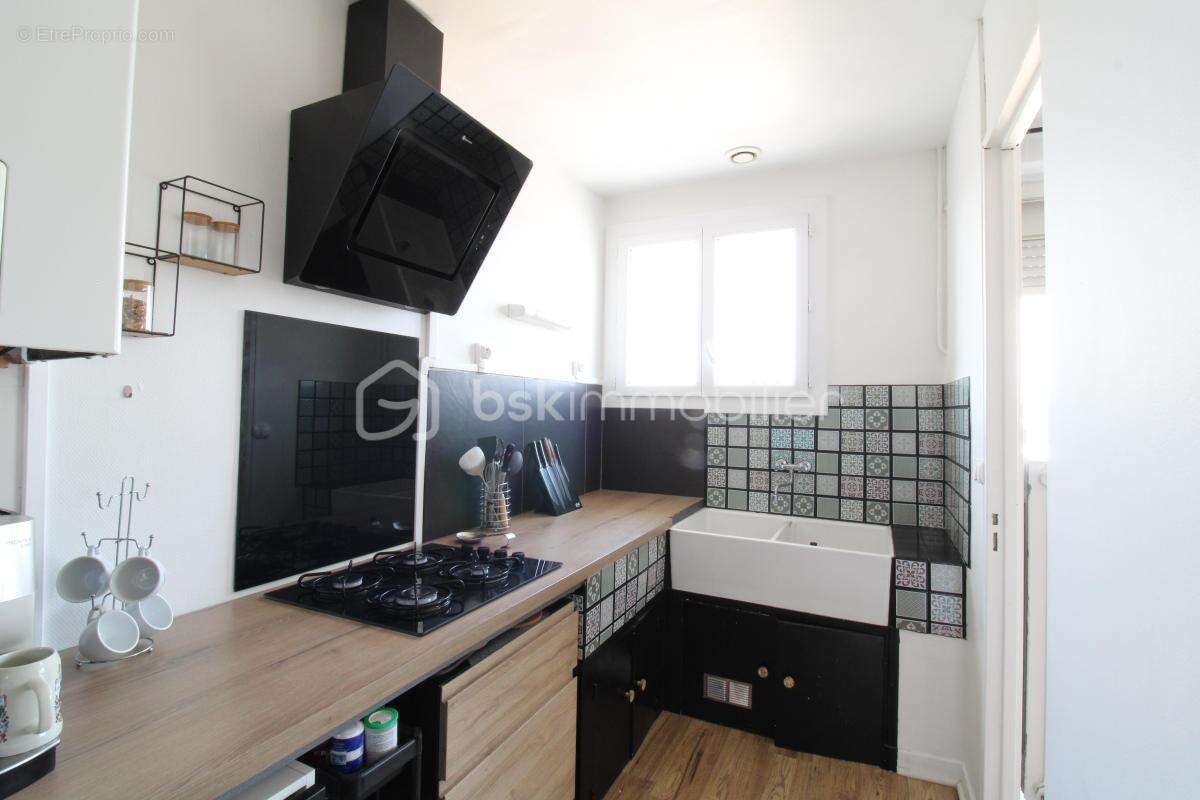 Grand T2 proche centre ville - photo 3