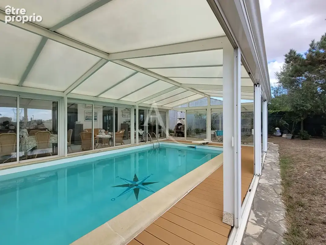 Maison de plain-pied avec piscine à La Jarrie - photo 11