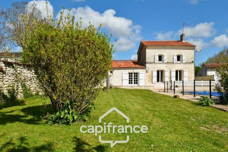 Maison à vendre 5 pièces TORXE (17) avec jardin clos de 1000m², garage et atelier - photo 5