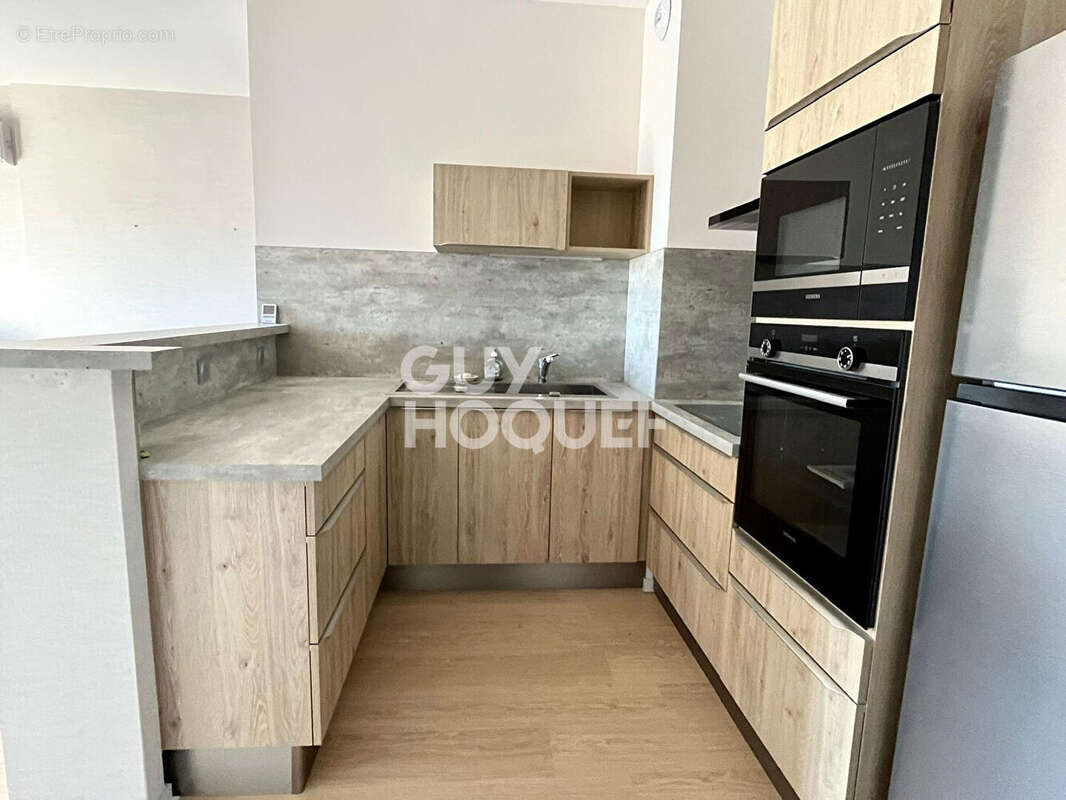 Appartement T2 climatisé avec terrasse et garage fermé - photo 2
