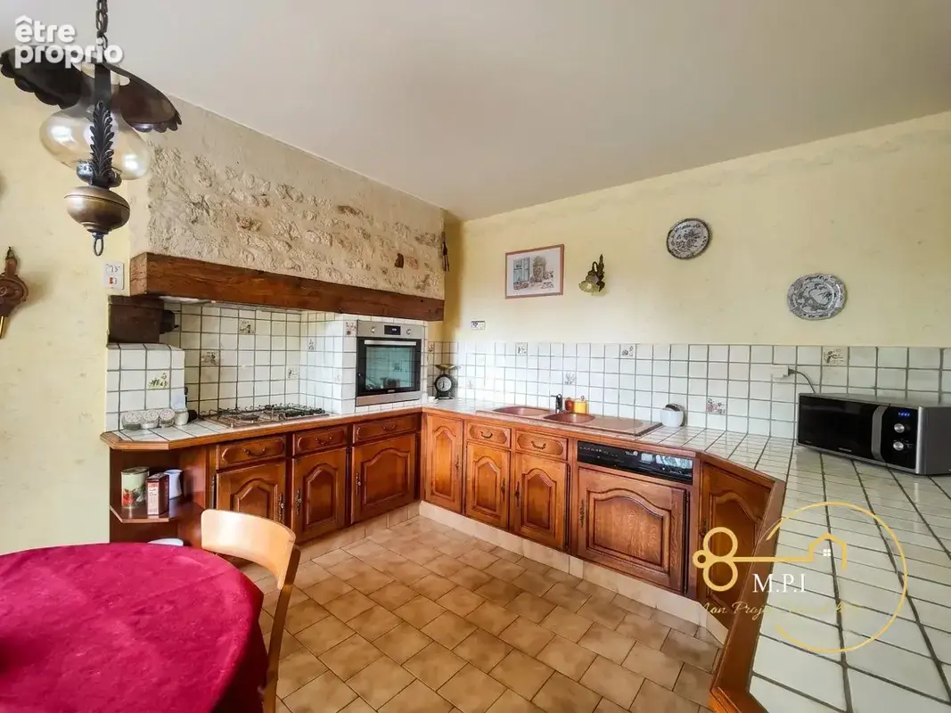 Maison 7 pièces 136 m² à vendre à Coulonges-Sur-Sarthe (61170) - photo 8