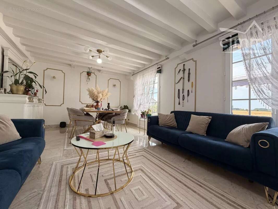MER – Maison sur sous-sol complet de 130 m² – 4 chambres – Terrain de 970 m² avec vue dégagée sur les champs - photo 5