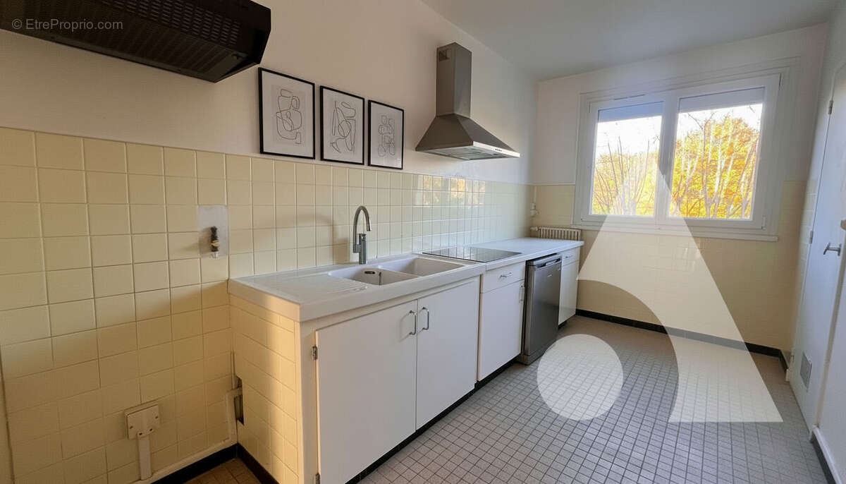 Appartement f3 avec cave et parking privé fermé - photo 9