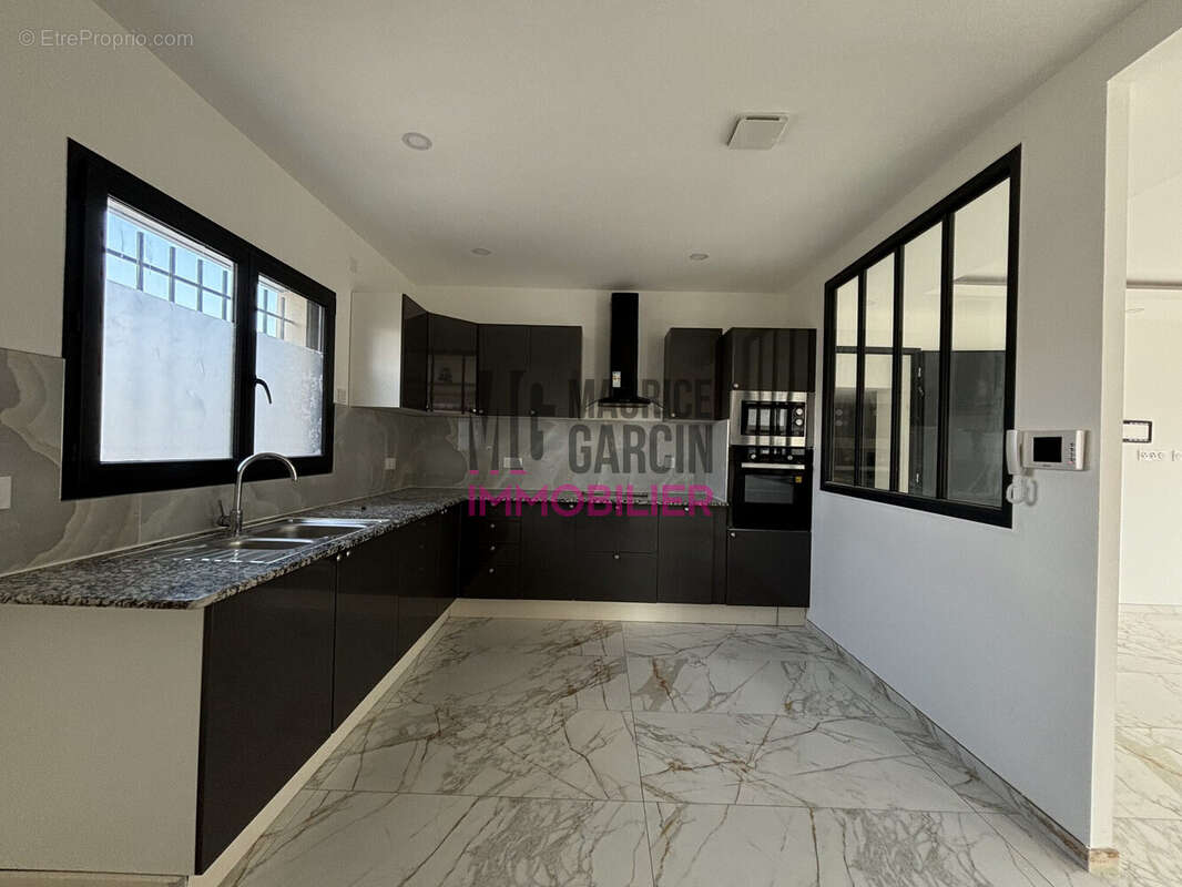 Maison à LAUDUN-L'ARDOISE