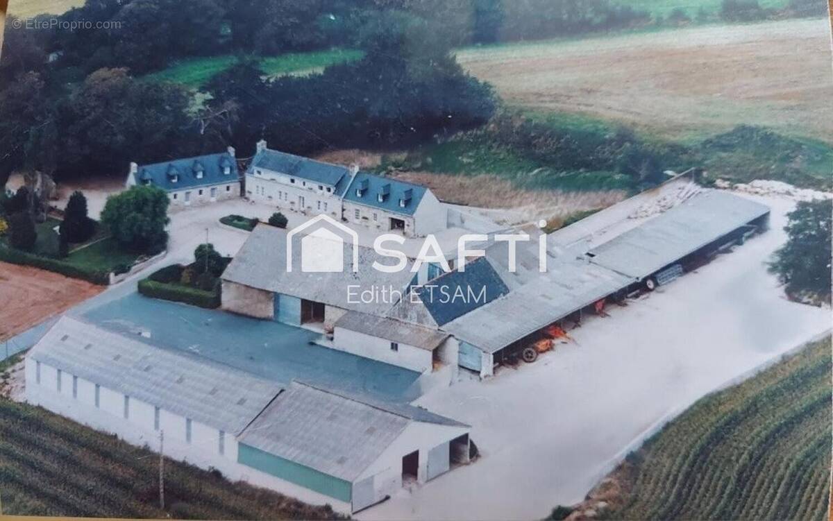 Photo 1 - Maison à PLUGUFFAN