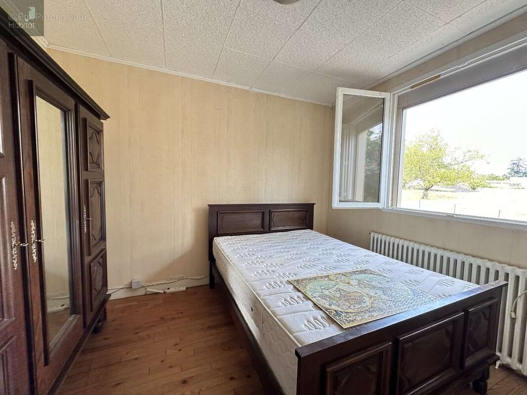 Proche du centre ville, quartier calme, Maison 4 chambres, garage, sur terrain de 630m² - photo 8