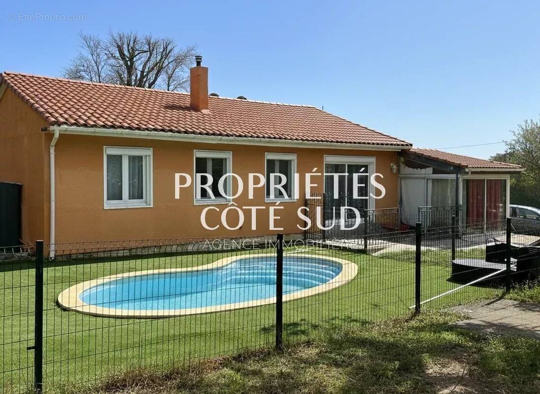 Maison à LAUDUN-L'ARDOISE