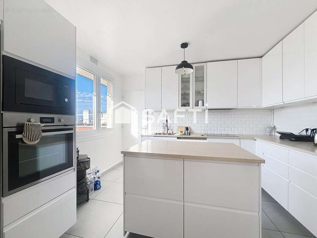 Photo 6 - Appartement à COURBEVOIE