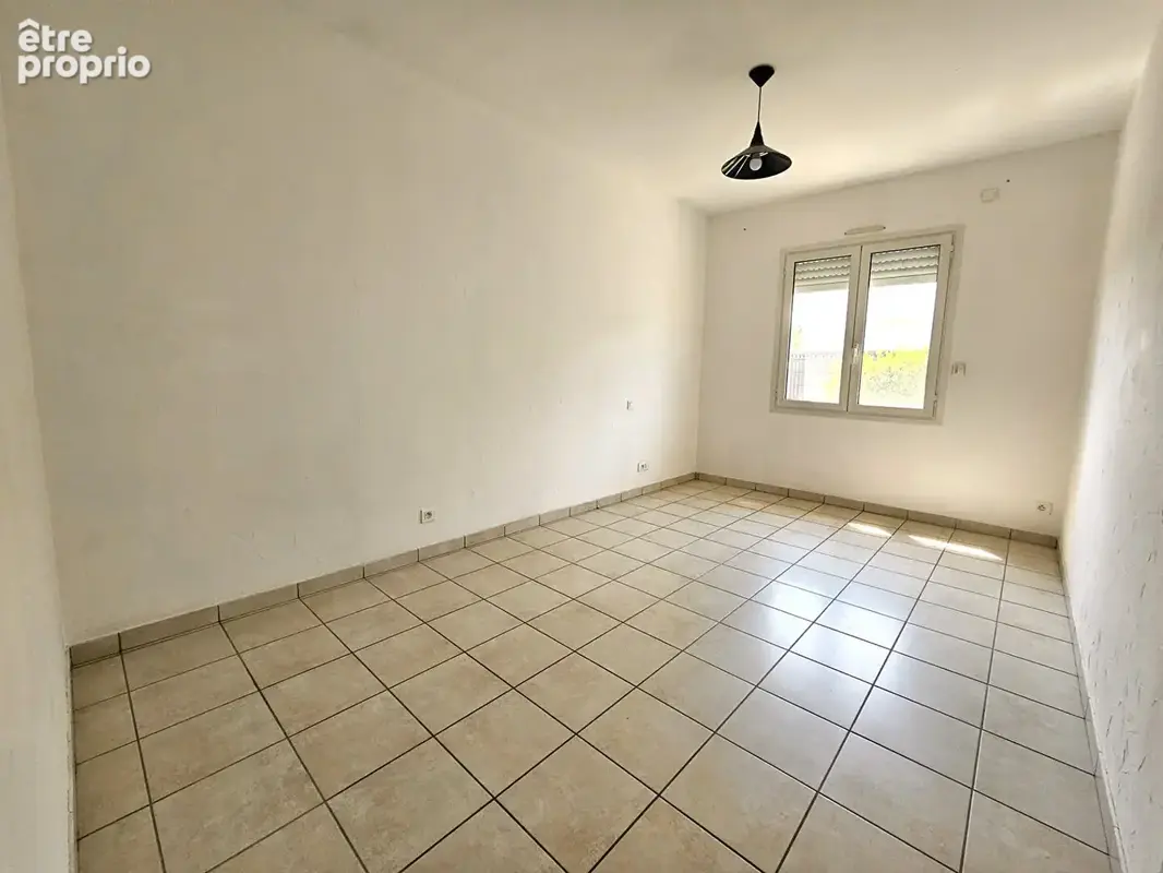 Maison 110 m²  avec 2 chambres, jardin et garage - photo 10