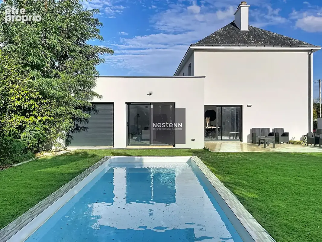 Maison aux grands volumes dans le centre de la Chapelle sur Erdre - photo 9